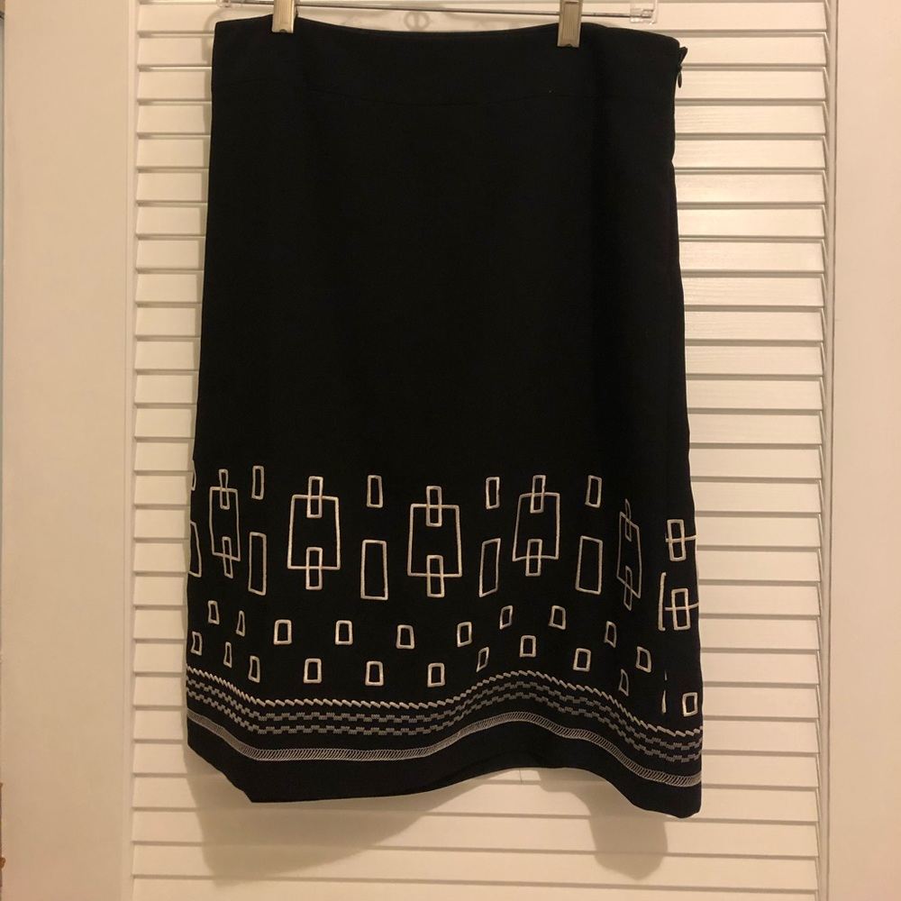 Black skirt with beige embroidery accent